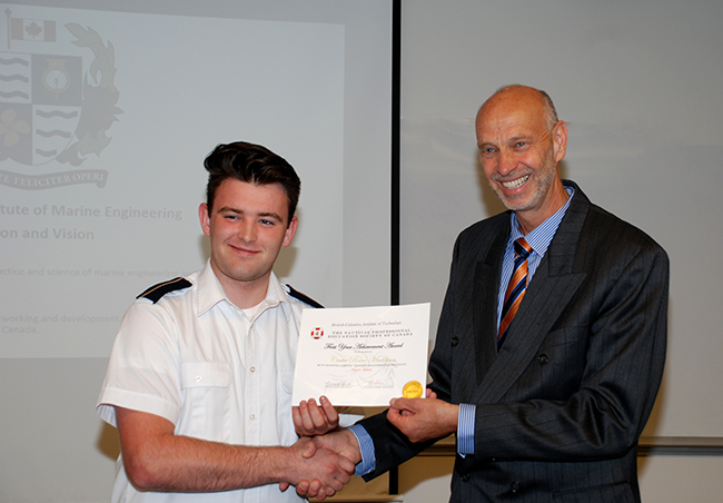 Captain Joachim Ruether presented Reece Maddison with the NPESC Award