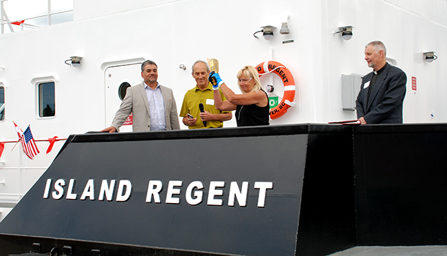 Nancy Ford christens the Island Regent.